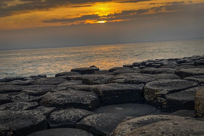 Giants Causeway Tour from Belfast + FREE Belfast Mural Tour - Ballintoy Harbour, the Iron Islands, and coastal quiet