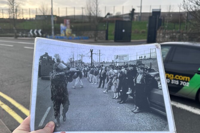 The Troubles and iconic award winning taxi 2hr private cab tour - The International Mural Wall on Divis Street